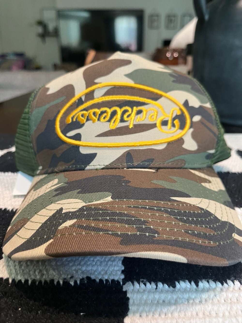 Young & Reckless Camo Trucker Hat with Yellow Logo Patch
